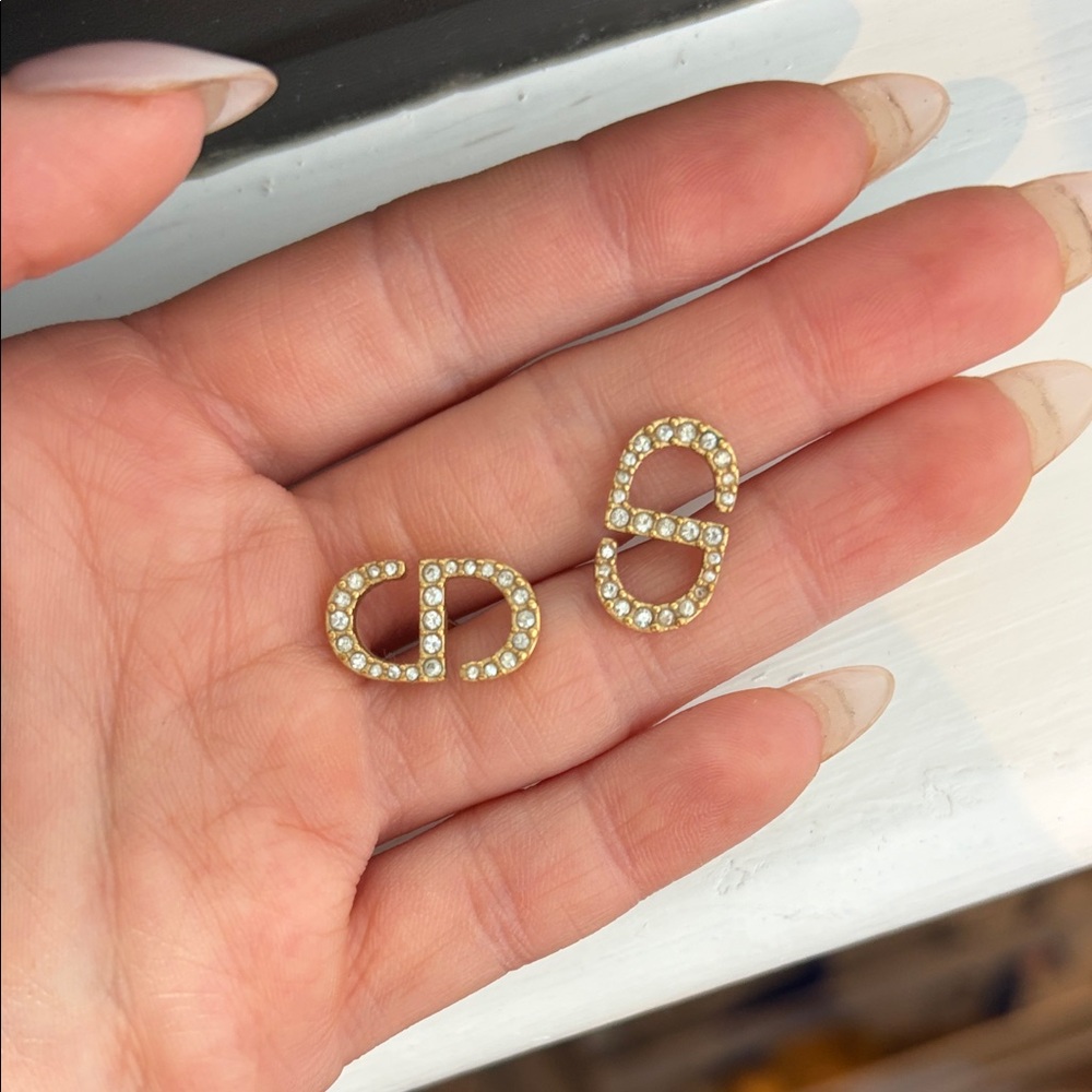 Petit CD Stud Earrings
Gold-Finish Metal and White Crystals